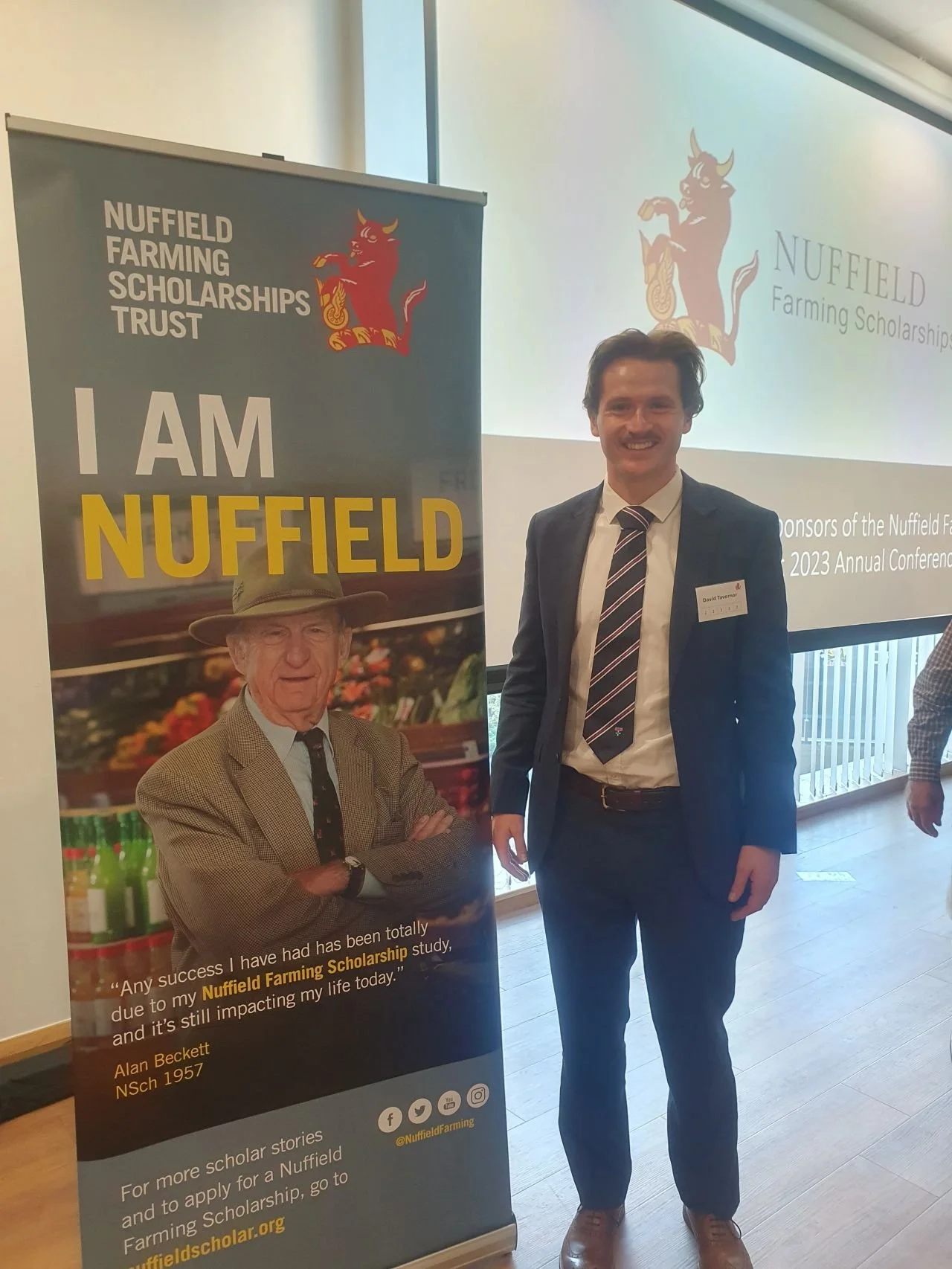 Fly2Feed founder, David Tavernor, honouring his sponsor, Alan and Anne Beckett, who couldn't be at the conference